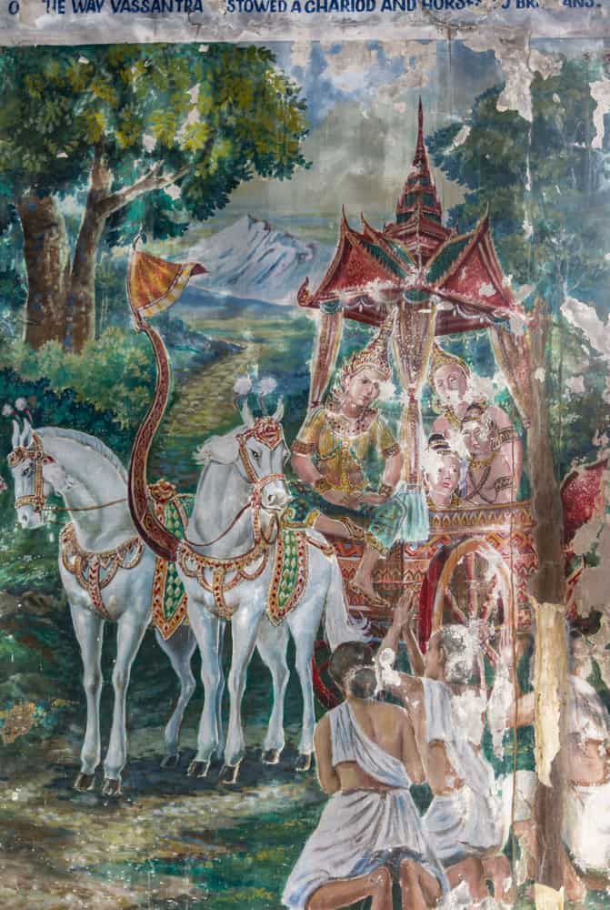 Zwei Pferde mit Kutsche und mehreren Personen stellen eine Episode aus dem Leben Buddhas dar